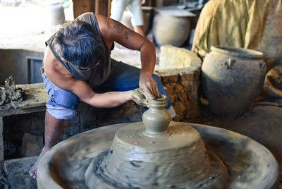 Man working in mud