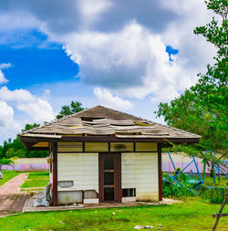 House on field against sky