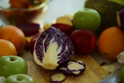 Close-up of multi colored fruits on cutting board