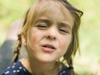 Close-up portrait of tired cute girl