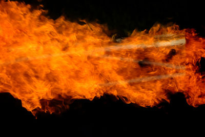 Close-up of fire against black background