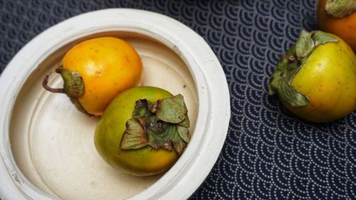 High angle view of fruits in bowl on table