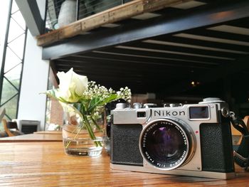 Close-up of camera on table