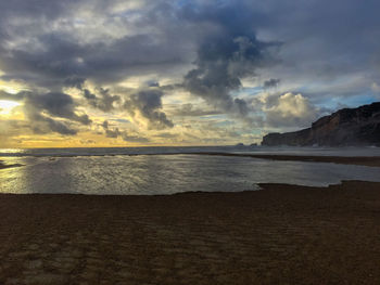 Scenic view of sea against sky during sunset