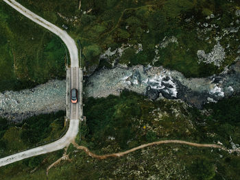 High angle view of road amidst trees