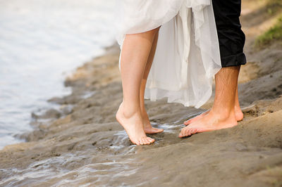 Low section of woman on beach