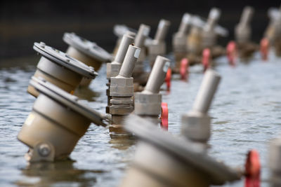 Engineering equipment of the fountain in close-up. a system of pipes and pumps for supplying 