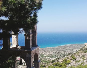 Scenic view of sea against clear blue sky