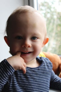 Close-up portrait of smiling boy