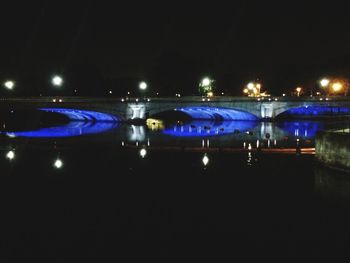 Illuminated lights in city at night