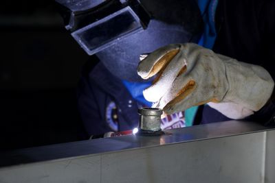 Man working on metal