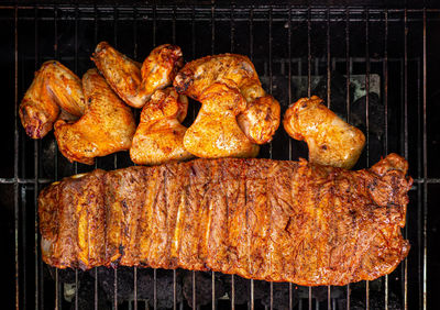 Close-up of meat on barbecue grill