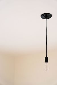 Close-up of light bulb hanging