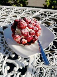 Close-up of strawberries in plate on table