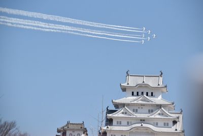 Low angle view of vapor trail against clear sky