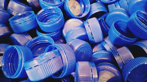 Full frame shot of blue objects, bottle caps  plastic
