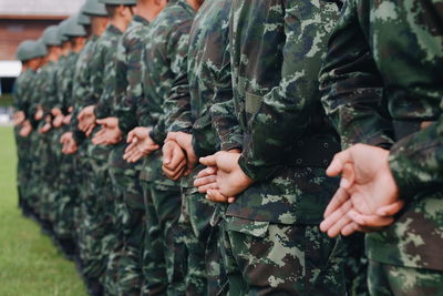 Close-up of soldiers in a row