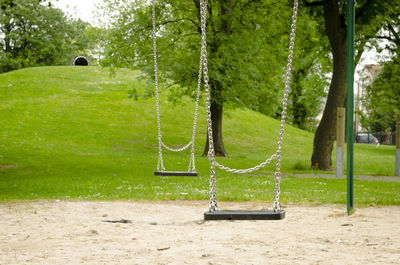 Empty swing in park