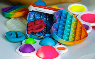 High angle view of multi colored candies on table