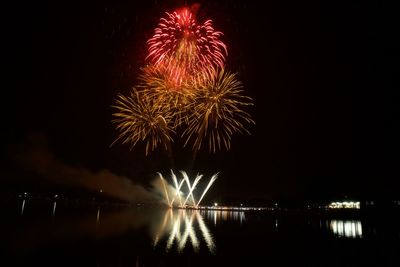 Firework display at night