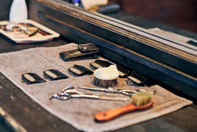 Close-up of work tools on table