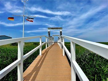 View of footbridge against sky