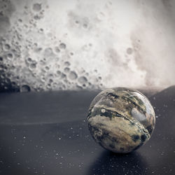 Close-up of ball on glass