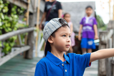 Close-up of boy looking away