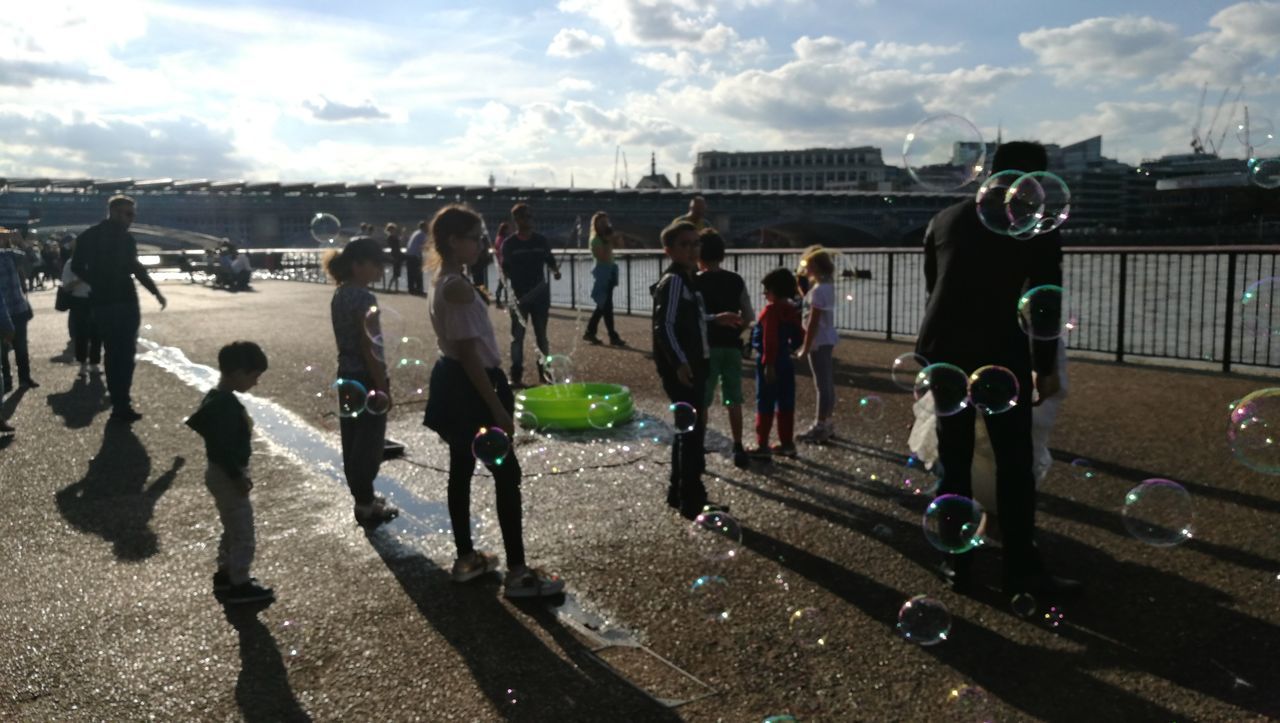 London southbank children playing with soapy bubbles