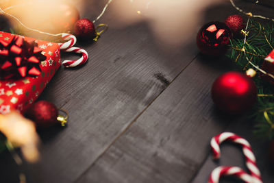 Christmas decorations on gray wooden table, christmas gifts. high quality photo