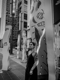 Full length of woman standing in city