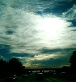 Road against cloudy sky