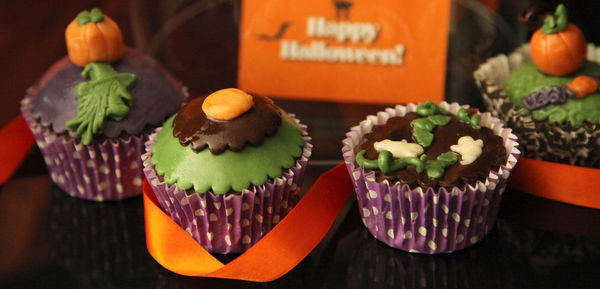 Panoramic shot of halloween cupcakes