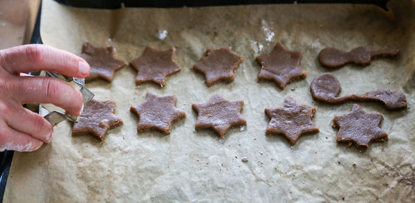 Close-up of hand holding cookies