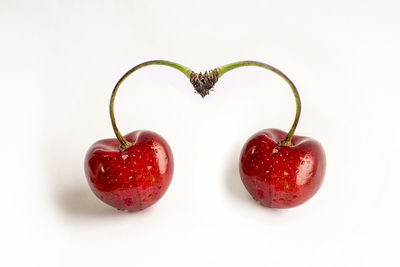 Close-up of strawberry over white background