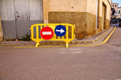 Road sign on street in city