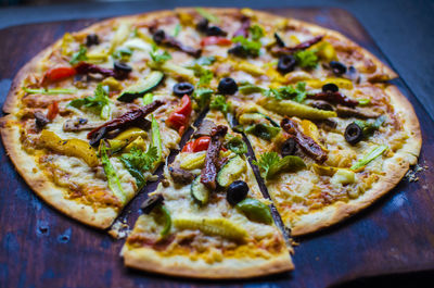 Close-up of pizza served on table