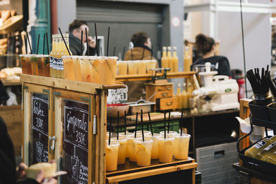 People at market stall