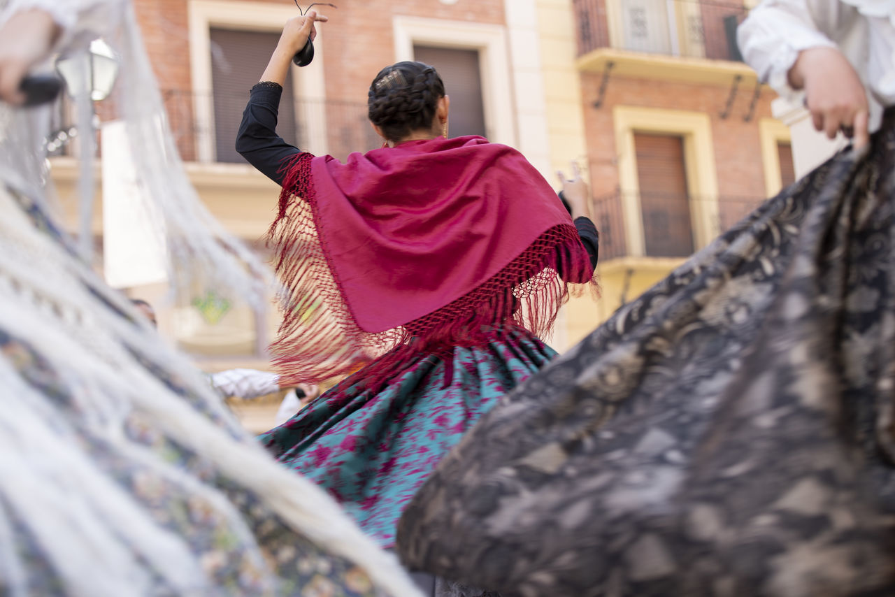 adult, clothing, selective focus, spring, fashion, women, architecture, tradition, rear view, traditional clothing, men, one person, dress, outdoors, celebration, lifestyles, day, young adult, building exterior