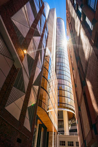 Low angle view of modern buildings against sky