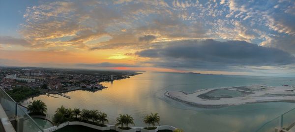 High angle view of city at sunset