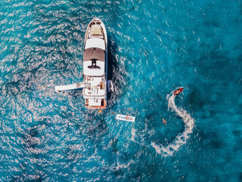 High angle view of ship sailing in sea