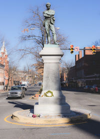 Statue of woman in park