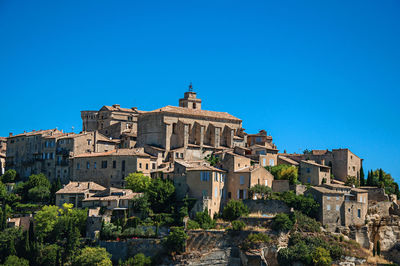 Panoramic view of the gordes village on top of hill, in the french provence.