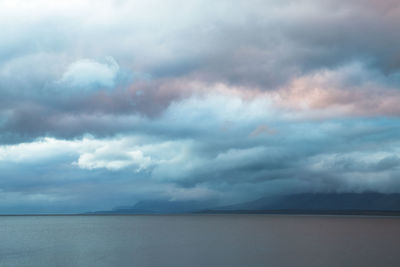 Scenic view of sea against dramatic sky