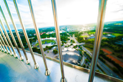 Close-up of railing against window