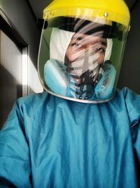 Portrait of man wearing protective mask