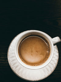 High angle view of coffee on table