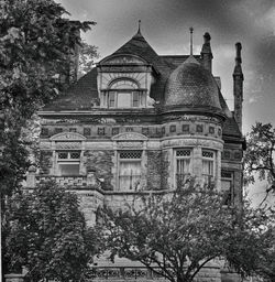 Exterior of historic building against sky