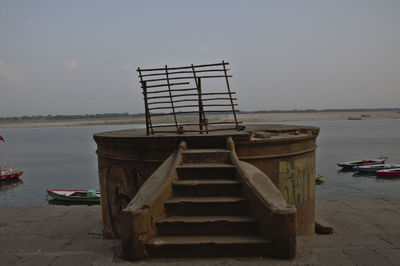 Pier over sea against sky